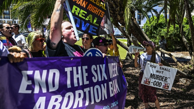 Anti-abortion activists, right, protest near the a pro-choice rally to protect abortion rights for Floridians, in Orlando on April 13. Photographer: Chandan Khanna/AFP/Getty Images