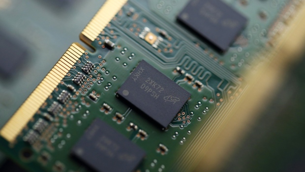 Micron Technology Inc. Double-Data-Rate Synchronous Random-Access Memory (SDRAM) chips are arranged for a photograph in Tokyo, Japan. 