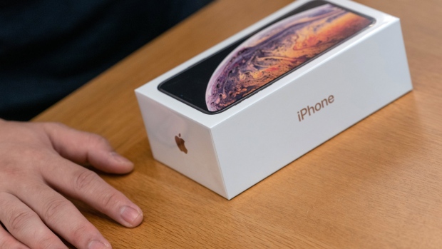 A box of the Apple Inc. iPhone XS sits at an Apple store during its launch in Hong Kong, China, on Friday, Sept. 21, 2018. The iPhone XS is up to $200 more expensive than last year's already pricey iPhone X and represents one of the smallest advances in the product line's history. But that means little to the Apple faithful or those seeking to upgrade their older iPhone. 