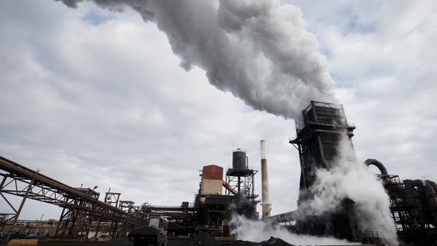 Steam rises from a coke quenching tower at the Stelco Holdings Inc. plant in Nanticoke, Ontario, Canada, on Tuesday, Nov. 14, 2017. The 107-year-old company just completed the first initial public offering of a North American steelmaker in seven years. 