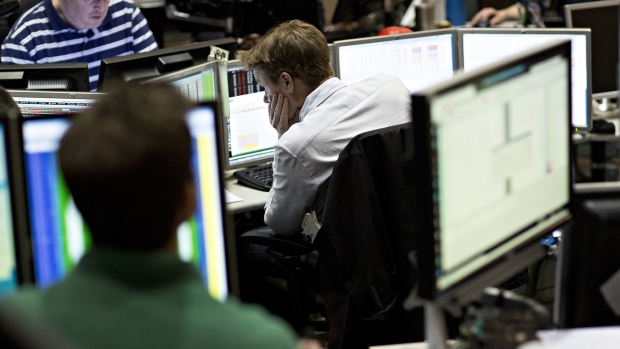 Traders work in the Cboe Volatility Index pit on the floor of the Cboe Global Markets Inc. building in Chicago. 