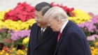 U.S. President Donald Trump, right, speaks with Xi Jinping, China's president, during a welcome ceremony outside the Great Hall of the People in Beijing on Nov. 9, 2017. 