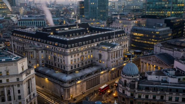 The Bank of England (BOE) stands illuminated at dawn in the City of London, U.K., on Monday, Feb. 25, 2019. The U.K. and U.S. sought to allay fears of disruption in the multitrillion-dollar derivatives market, vowing to put in place emergency policies to ensure trading continues uninterrupted in the event of a no-deal Brexit. 
