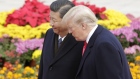 U.S. President Donald Trump, right, speaks with Xi Jinping, China's president, during a welcome ceremony outside the Great Hall of the People in Beijing, China, on Thursday, Nov. 9, 2017. Photographer: Qilai Shen/Bloomberg