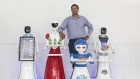 an McGowan CEO of Autonetics Universe is pictured with robots