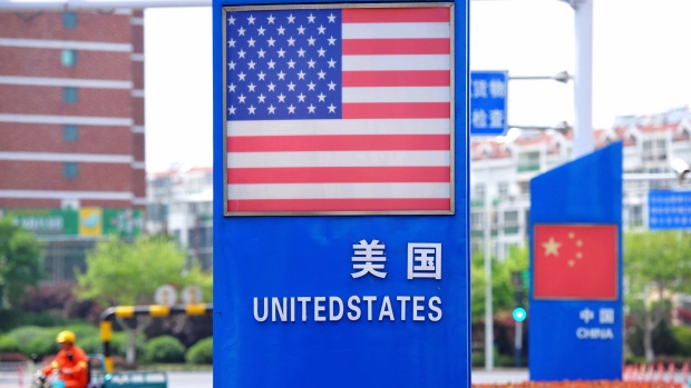 U.S. and Chinese flags in a special trade zone in Qingdao in eastern China's Shandong province
