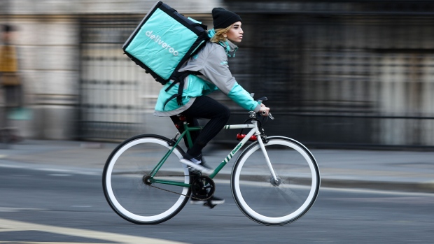 A food delivery cycle courier for Deliveroo. 