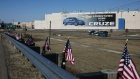 American flags fly in front of the General Motors Co. plant in Lordstown, Ohio, U.S., on Tuesday, March 26, 2019.