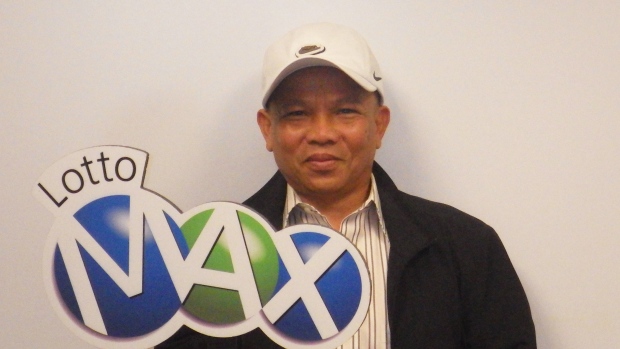 Bon Truong, who won $60-million in a Lotto Max draw, poses in St.Albert, Alta. on Wednesday, Aug.28.
