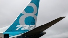 The tail fin of a Boeing Co. 737 Max Aircraft stands on display during preparations ahead of the Farnborough International Airshow 2016 in Farnborough, U.K. 