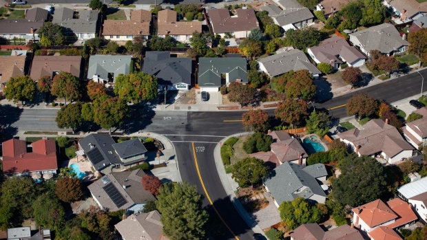 Houses stand in this aerial photograph taken near Cupertino, California, Oct. 23, 2019. Bloomberg