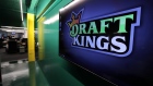 In this May 2, 2019, file photo, the DraftKings logo is displayed at the sports betting company head