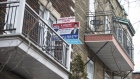 A "For Sale" sign is displayed outside a home in the Le Plateau Mont-Royal borough of Montreal, Quebec, Canada, on Saturday, April 14, 2018. An economic revival in Canada's second-biggest city is fueling a real-estate renaissance, speeding up sales, shrinking inventories, and luring foreign buyers. 