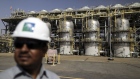 An employee visits the Natural Gas Liquids (NGL) facility at Saudi Aramco's Shaybah oil field in the Rub' Al-Khali desert, also known as the 'Empty Quarter,' in Shaybah, Saudi Arabia, on Tuesday, Oct. 2, 2018. Saudi Arabia is seeking to transform its crude-dependent economy by developing new industries, and is pushing into petrochemicals as a way to earn more from its energy deposits. 