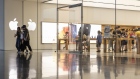 Customers leave an Apple Inc. store in Xiamen, China. Bloomberg/Qilai Shen