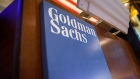 Goldman Sachs Group Inc. signage is displayed at the company's booth on the floor of the New York Stock Exchange (NYSE) in New York, U.S., on Tuesday, May 30, 2017. U.S. stocks halted a seven-day advance, while the dollar fluctuated as data showing a rebound in consumer spending offset a wider selloff in commodities. The euro slipped with equities in the region. Photographer: Bloomberg/Bloomberg