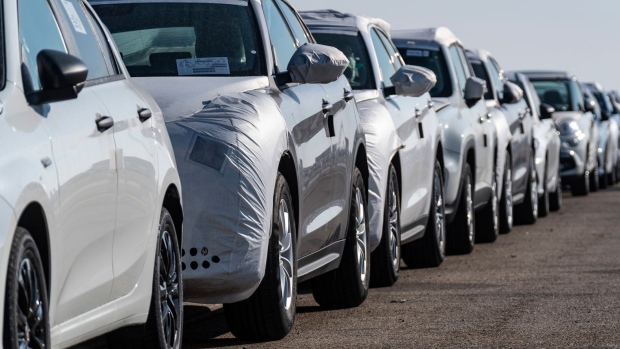 A line of Alfa Romeo Stelvio automobiles, manufactured by Fiat Chrysler Automobiles NV, sit on the quayside after being shipped from Morocco, at the Port of Marseille in Marseille, France, on Thursday, Jan. 17, 2019. Shares of European carmakers gained on Wednesday, after U.K. Prime Minister Theresa May's defeated plan in Parliament increased the chances of a delay in Brexit. Photographer: Balint Porneczi/Bloomberg
