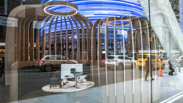 Meeting pods are seen through a window of a JP Morgan Chase & Co. bank branch on Madison Avenue