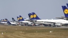 Deutsche Lufthansa planes grounded on the closed north west runway at Frankfurt Airport on March 25. Photographer: Alex Kraus/Bloomberg