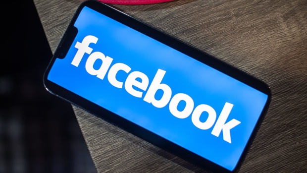 The Facebook logo on a smartphone arranged in Hastings-on-Hudson, New York, US, on Wednesday, Feb. 1, 2023. Meta Platforms Inc. is scheduled to release earnings figures on February 1. Photographer: Tiffany Hagler-Geard/Bloomberg