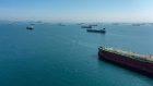 Cargo ships wait in the anchor zone to cross the Panama Canal from the Pacific entrance near Panama City, Panama, on Friday, Sept. 1, 2023. Ships have been waiting for days as the congestion to cross from both sides increase due to the intense droughts in the country during the rainy season.
