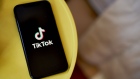 The TikTok logo on a smartphone arranged in the Brooklyn borough of New York, US, on Thursday, March 9, 2023. Photographer: Gabby Jones/Bloomberg