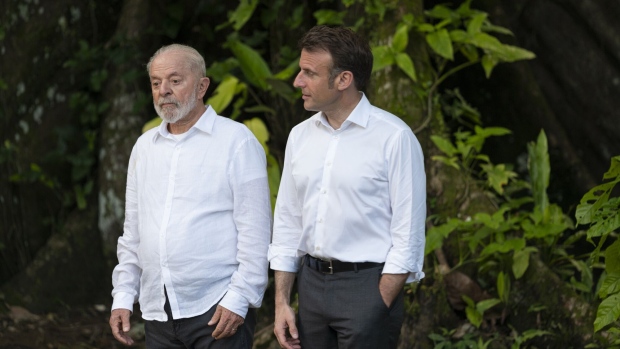 Luiz Inacio Lula da Silva and Emmanuel Macron during a visit to Combu Island, near Belem, capital of the Brazilian state of Para on March 26.