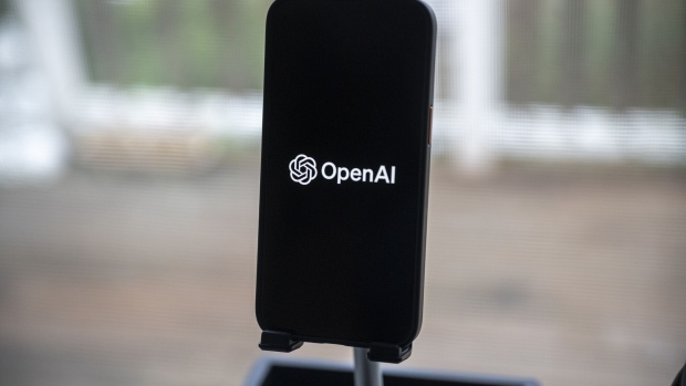 The Open AI logo on a smartphone arranged in Crockett, California, US, on Friday, Dec. 29, 2023. Microsoft has invested some $13 billion in OpenAI and integrated its products into its core businesses, quickly becoming the undisputed leader of AI among big tech firms. Photographer: David Paul Morris/Bloomberg