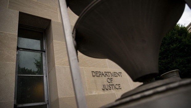 The US Department of Justice (DOJ) headquarters in Washington, DC, US, on Thursday, July 27, 2023. Donald Trump's lawyers are expecting the former president to be indicted as soon as Thursday over attempts to overturn the result of the 2020 election, according to a person familiar with the matter. Photographer: Al Drago/Bloomberg