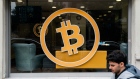 A bitcoin logo in the window of a cryptocurrency exchange bureau in Istanbul, Turkey, on Friday, March 1, 2024. Bitcoin has jumped over 40% already this year atop the successful debut of the US ETFs, which directly hold the token. Photographer: David Lombeida/Bloomberg