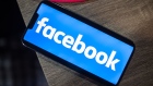 <p>The Facebook logo on a smartphone.</p>