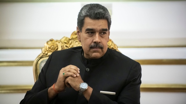 Nicolas Maduro, Venezuela's president, listens during a meeting with Sergei Lavrov, Russia's foreign minister, not pictured, at Miraflores Palace in Caracas, Venezuela, on Tuesday, Feb. 20, 2024. Russia and Venezuela agreed to broaden their oil production cooperation, Russia's Lavrov said from Caracas. Photographer: Carlos Becerra/Bloomberg Photographer: Carlos Becerra/Bloomberg