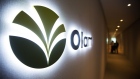 The Olam International Ltd. logo is displayed at the company's office in Singapore, on Monday, Aug. 14, 2017. Olam predicts cocoa market conditions will stabilize this half after volatile prices hit earnings for another quarter. Photographer: Nicky Loh/Bloomberg