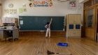 <p>A second-grade student cleans a classroom in Tamba, Hyogo Prefecture, Japan.</p>