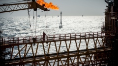 A gas flare burns from a pipe aboard an offshore oil platform in the Persian Gulf's Salman Oil Field, operated by the National Iranian Offshore Oil Co., near Lavan island, Iran, on Thursday, Jan. 5. 2017. Nov. 5 is the day when sweeping U.S. sanctions on Iran’s energy and banking sectors go back into effect after Trump’s decision in May to walk away from the six-nation deal with Iran that suspended them. Photographer: Ali Mohammadi/Bloomberg
