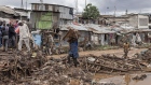 Residents among the debris following heavy rains in the informal settlement of Mathare in Nairobi, Kenya, on April 25.
