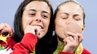 Meaghan Benfeito and Roseline Filion celebrate bronze