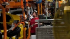 An assembly line worker at the General Motors Assembly plant in Oshawa