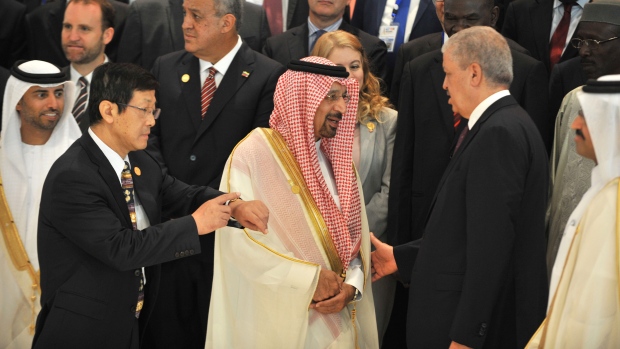 Algerian Prime Minister Abdelmalek Sellal, right, with Saudi Minister of Energy Khalid Al-Falih 