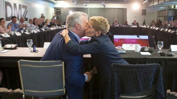 Ontario Premier Kathleen Wynne and Quebec Premier Philippe Couillard