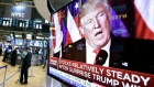 An image of U.S. President-elect Donald Trump appears on a TV screen at the New York Stock Exchange