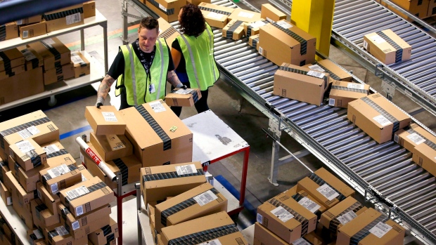 Amazon employees organize outbound packages on Cyber Monday