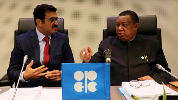 Mohammed Bin Saleh Al-Sada, OPEC Conference president, with Mohammad Sanusi Barkindo