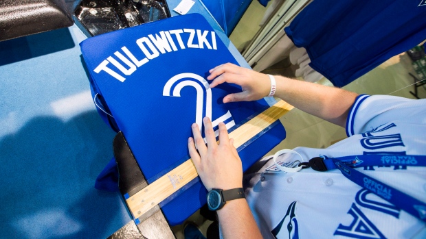 A Blue Jays shop employee makes a Troy Tulowitzki jersey.