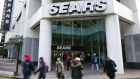 People walk past the main Sears store in downtown Vancouver, British Columbia February 23, 2011.