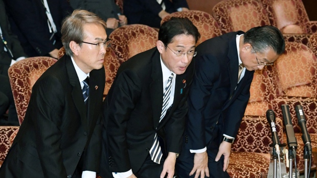 Japanese Ministers after TPP was approved at the parliament's upper house in Tokyo Friday, Dec. 9. 