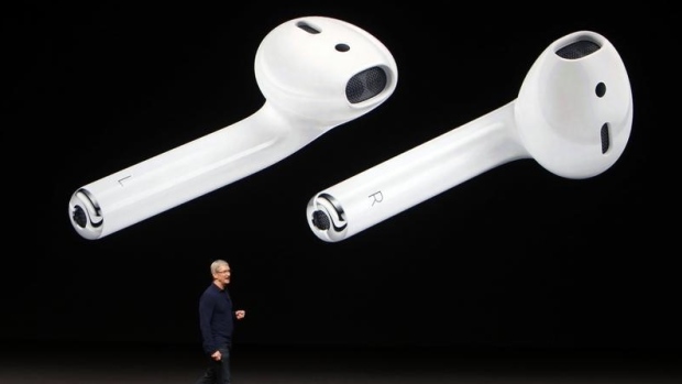 Apple unveils its AirPod headphones