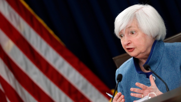 Federal Reserve Board Chair Janet Yellen answers a reporter's question