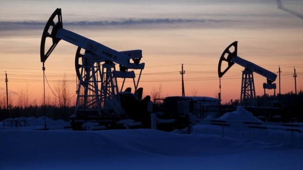 Pump jacks at the Lukoil company owned Imilorskoye oil field outside Kogalym, Russia.