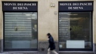 A man walks in front of the Monte dei Paschi bank in Siena, central Italy, January 29, 2016. 